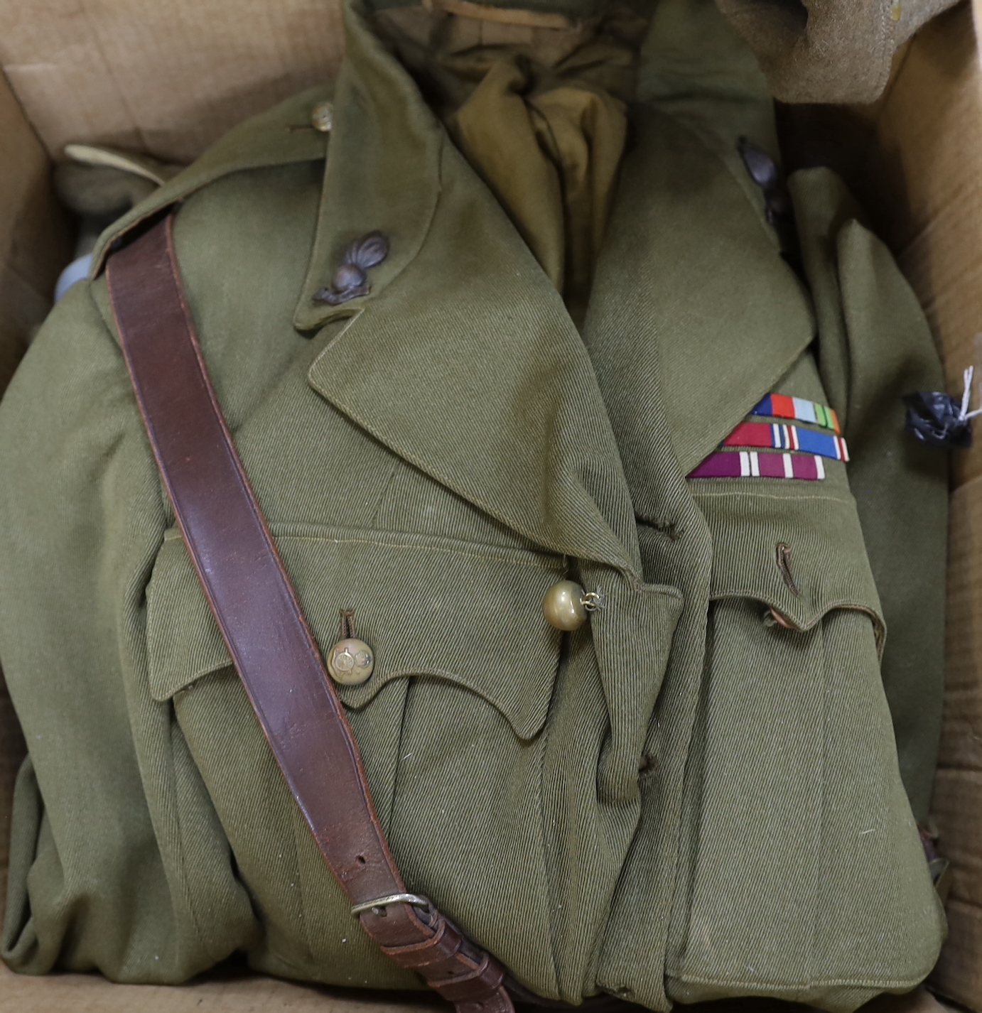 An RAF 'combined operations' khaki jacket, trousers, cap and beret, a Royal Artillery Grenadier's officer's jacket and trousers and an Royal Navy jacket, various caps and spats